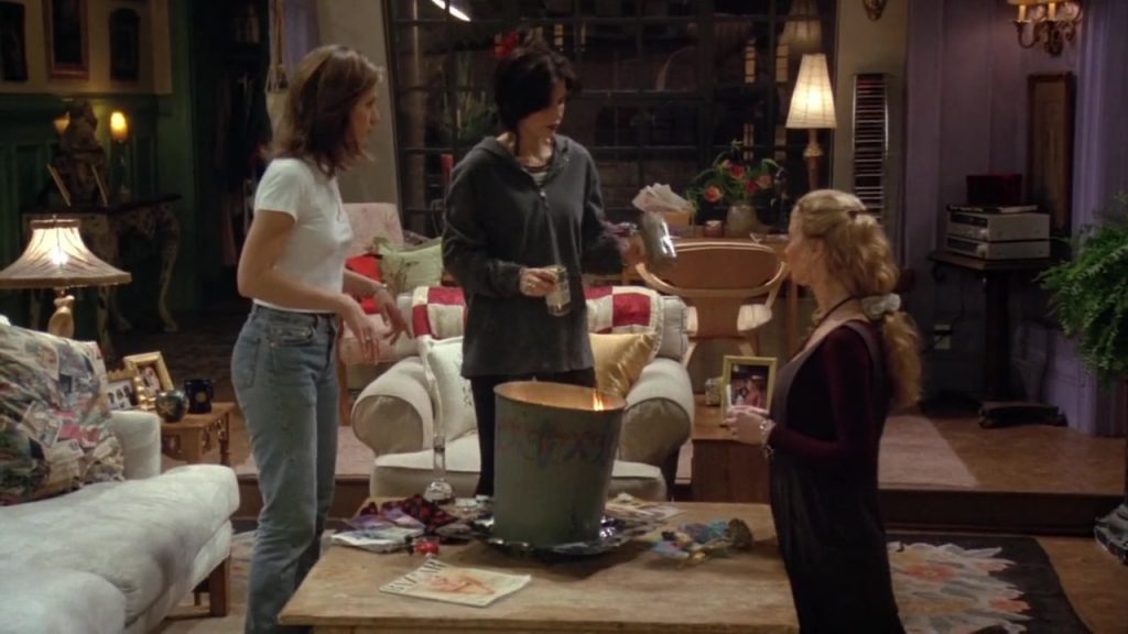 Monica, Rachel, and Phoebe holding a bonfire ritual in Friends S01 E14.