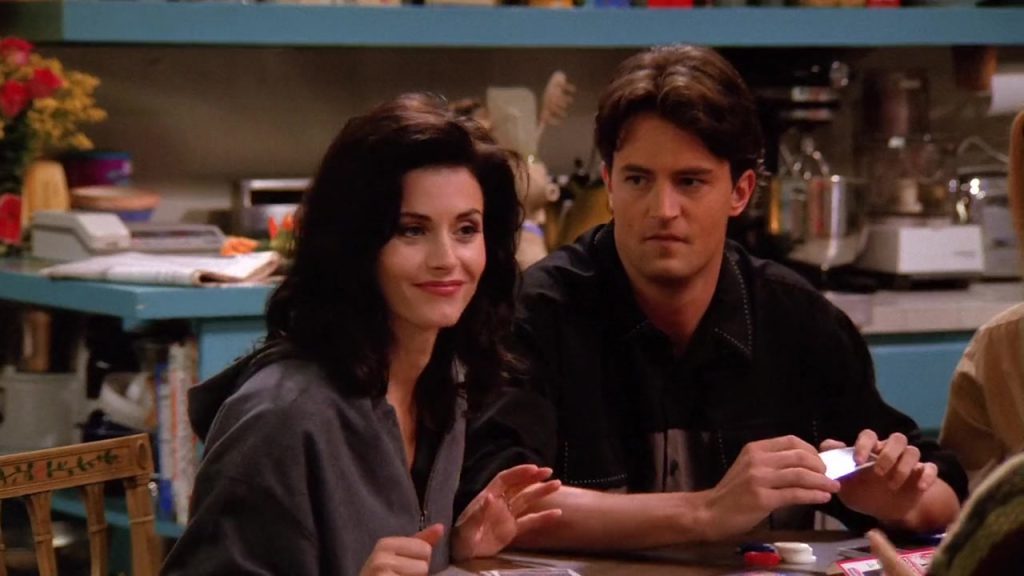 Chandler and Monica during the poker game in Friends, ideal for cinematic English study.