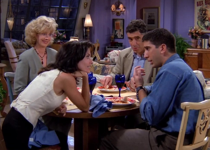 Ross and Monica Geller having dinner with their parents in a scene from Friends Season 1 Episode 2.