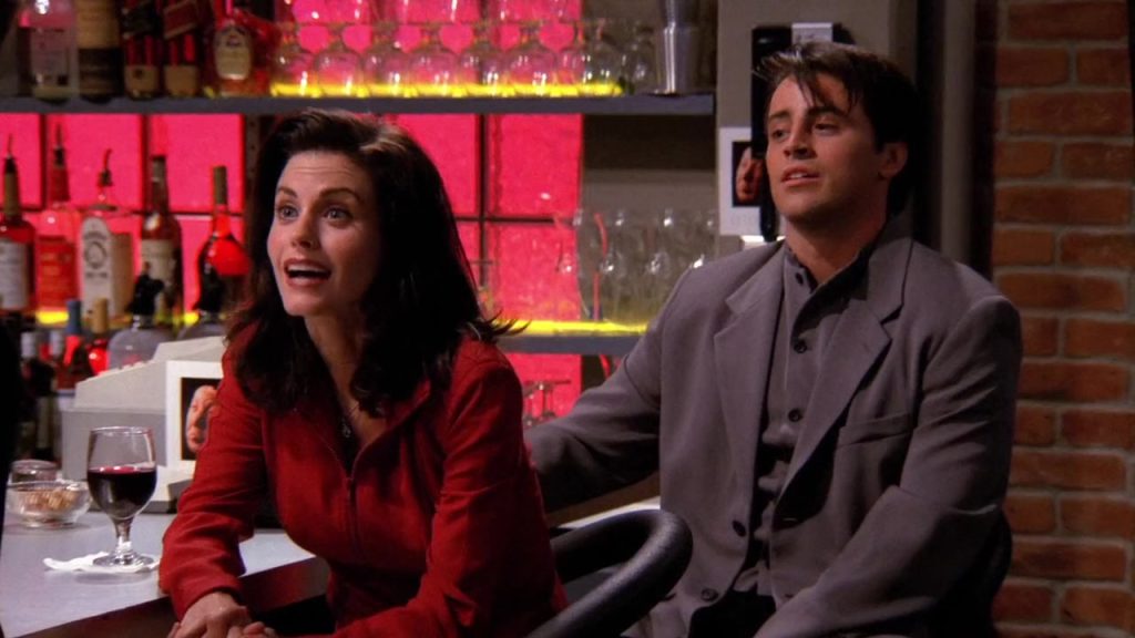 Monica and Joey sitting at Central Perk in Friends Season 1, Episode 5.