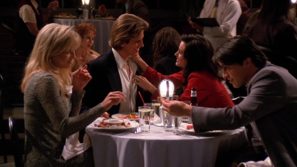 A humorous dinner scene with Monica, Joey, Angela, and Bob.