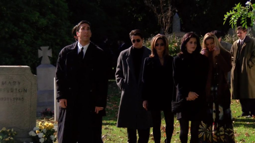 "The Friends group at the funeral paying respects in Friends S01E08."