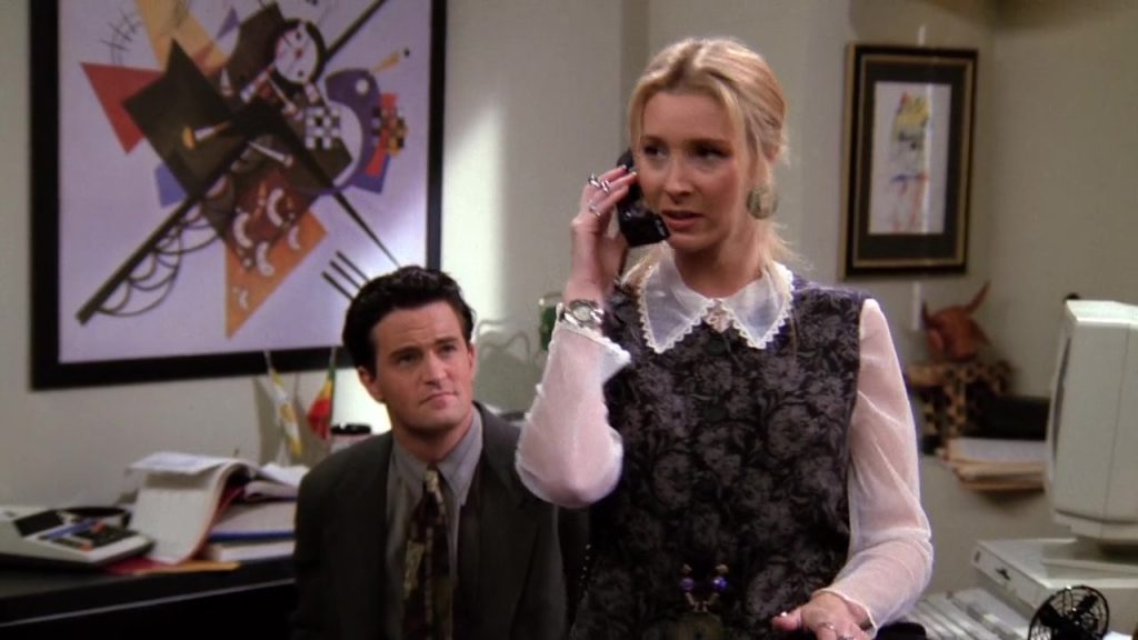 Phoebe answers a phone call at Chandler's office in Friends S01E22, a great example for language learning with Netflix.