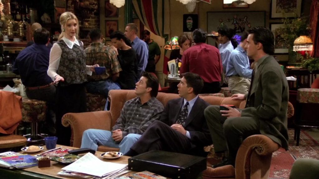 Joey and Ross at Central Perk with Phoebe from Friends S01E22, ideal for movie-based language learning.