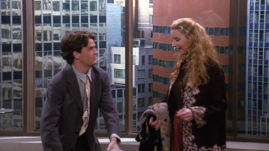 Chandler showing Phoebe around his new office in Friends S01 E15