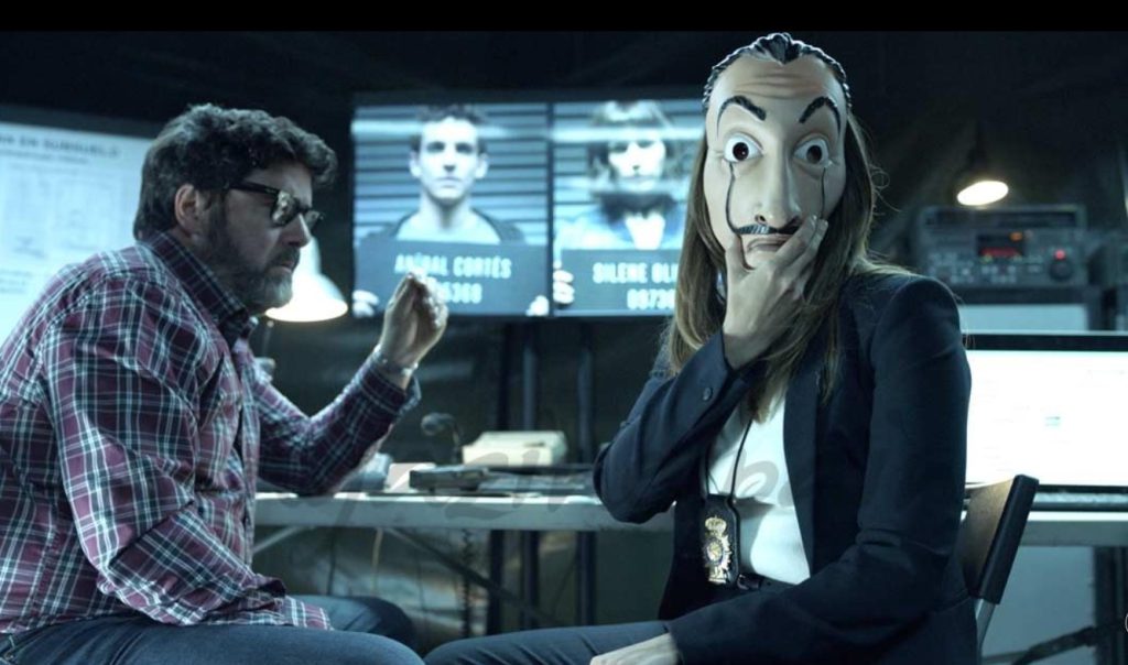 "Professor and team planning in Money Heist, ideal for streaming language practice."