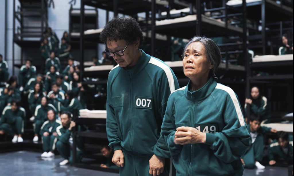 "Players in dorm room from Squid Game S02E03, watch learn languages with immersive scenes"