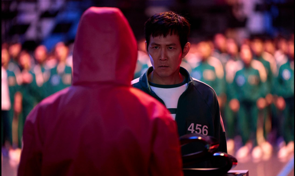 "Masked manager meeting players in Squid Game, language learning with Netflix"
