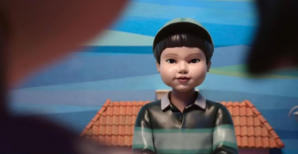 "The iconic doll from the Red Light, Green Light game in Squid Game – a fun way to learn English phrases and idioms."