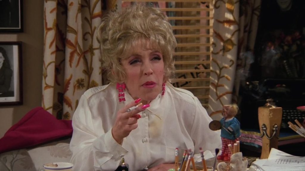  A humorous scene from Friends S02E19 with Estelle, showcasing her unique expressions, ideal for learning English vocabulary through movies.