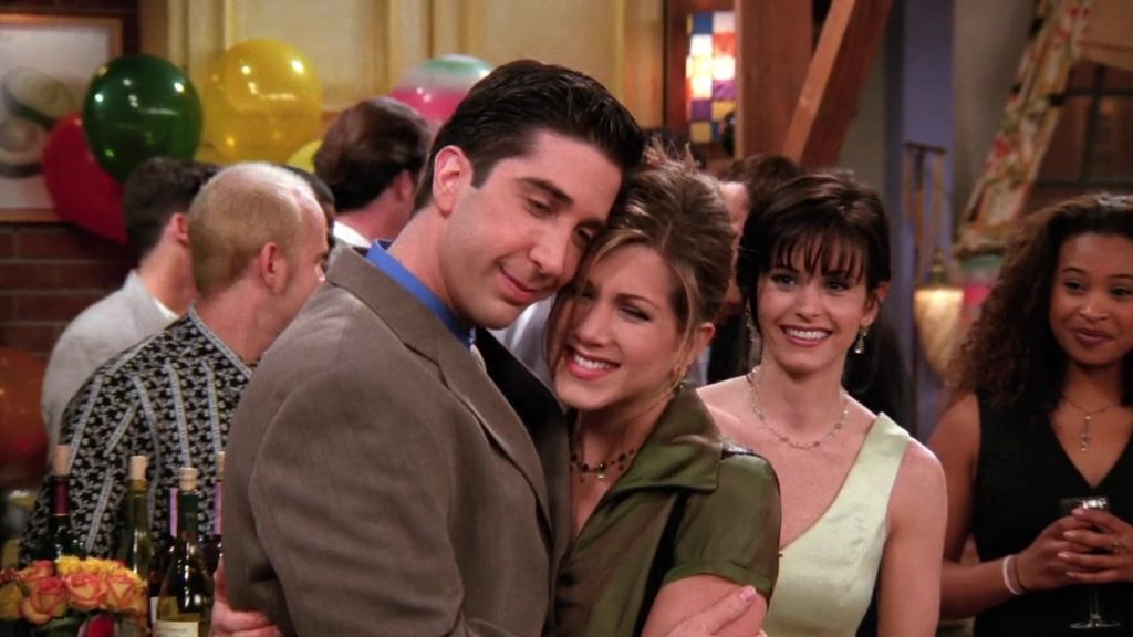 Ross and Rachel hugging at Rachel’s birthday party in Friends S02E22. A great example for learning English with TV series.