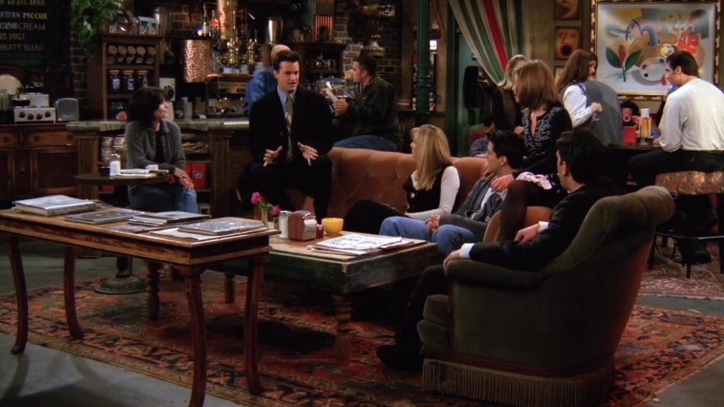 "Central Perk scene with all characters in Friends S02E13, ideal for Netflix Learning English."