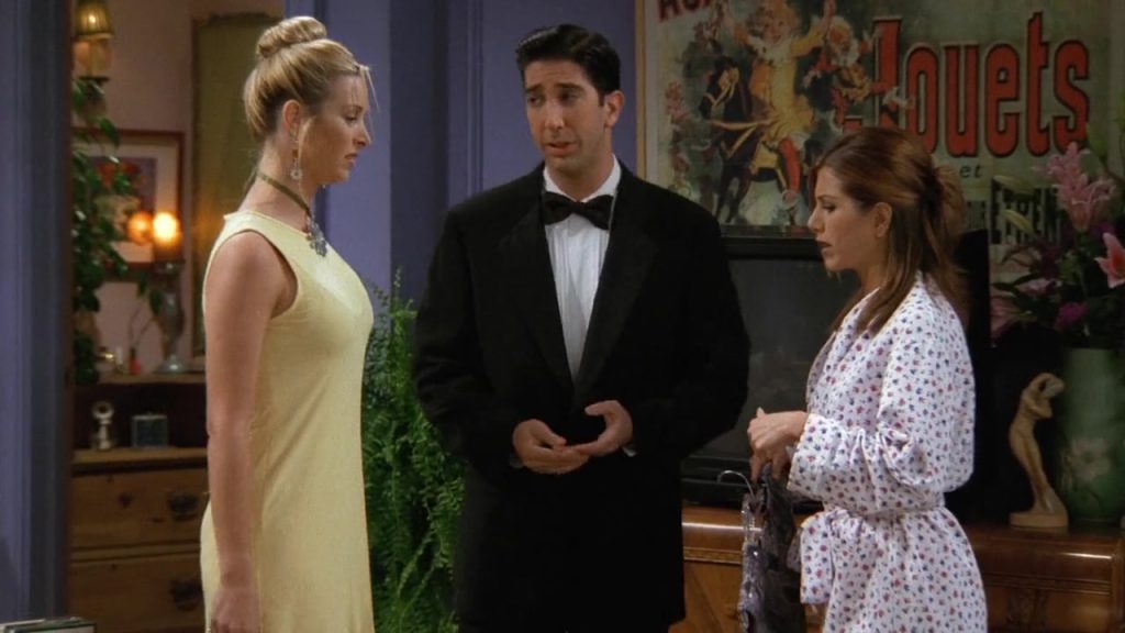 Ross in a tuxedo talking to Rachel and Phoebe in Friends S03E02, showcasing a perfect scene for language learning with Friends.