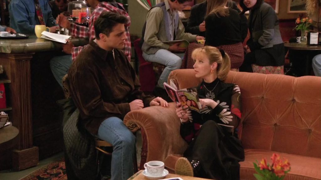 Joey showing Phoebe his feature in a magazine in Friends S02E18 - Movie For Language Learning.