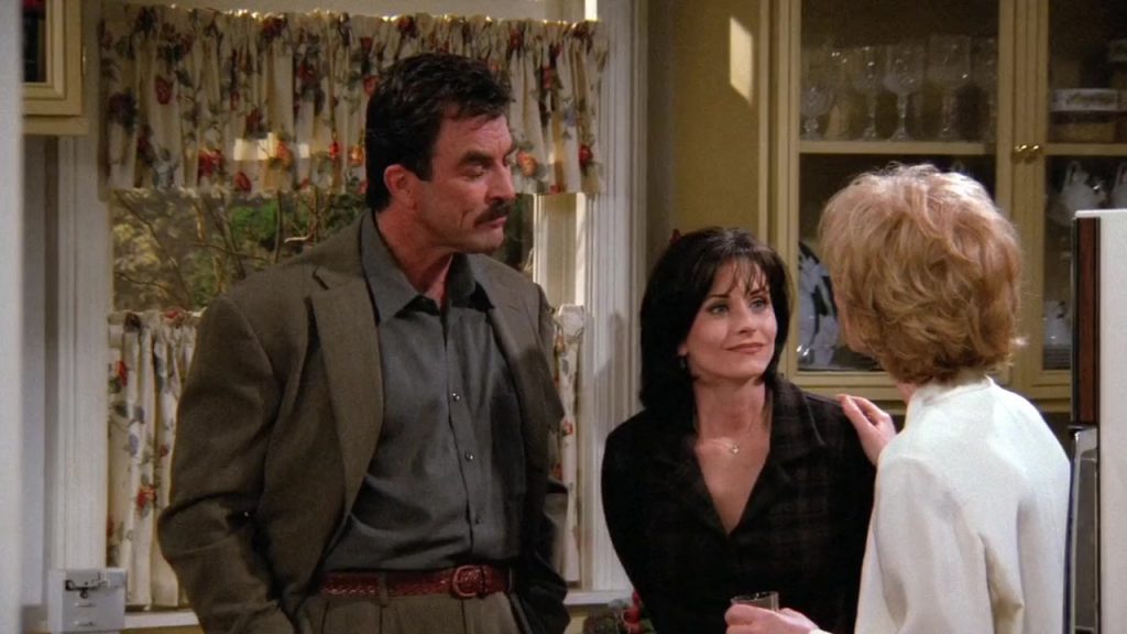 "Movie for language learning - Monica and Richard with family in Friends S02E16." "Monica introduces Richard to her family in Friends S02E16, showcasing cultural dynamics and vocabulary for language learning."