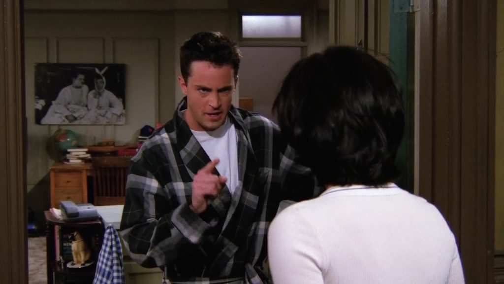 Chandler in a heated conversation with Monica in Friends S02E07, illustrating an engaging moment for Netflix Language Learning.