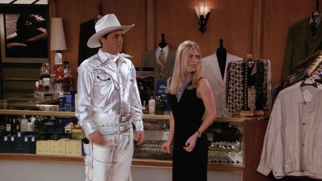 Joey dressed as a cowboy in Friends, a humorous moment that provides insight into idioms and English slang.