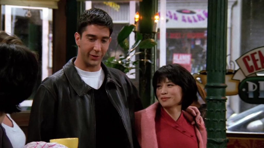Ross and Julie standing together in a cozy scene from Friends S02E07, perfect for Netflix Language Learning enthusiasts.