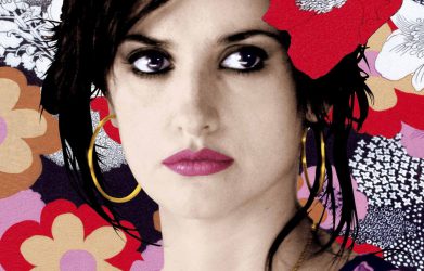Colorful movie poster of Volver featuring Penélope Cruz – Ideal Spanish movie for language learners